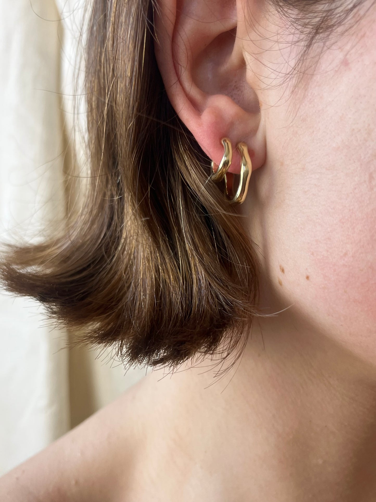 LIV, earring